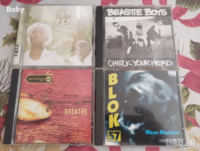 CD дискове PPP, Beastie Boys, Prodigy, Blok 57