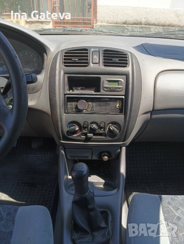 Mazda 323 1999, снимка 4 - Автомобили и джипове - 55094525
