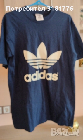 Мъжка тениска на Adidas с къс ръкав.