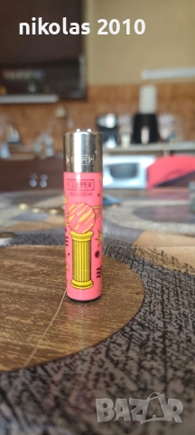 Колекция от 37 оригинални запалки Clipper + подарък дисплей (поставка), снимка 10 - Колекции - 54563525