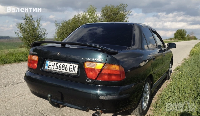 Продавам автомобил Mitsubishi Carisma  , снимка 11 - Автомобили и джипове - 54287441