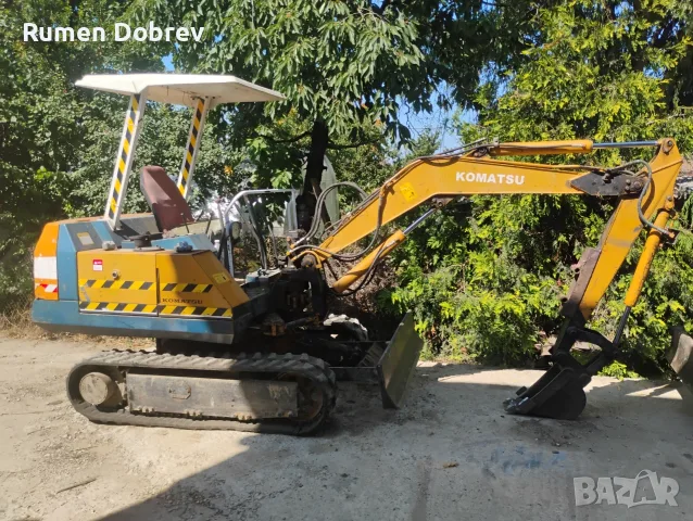 Мини багер Komatsu