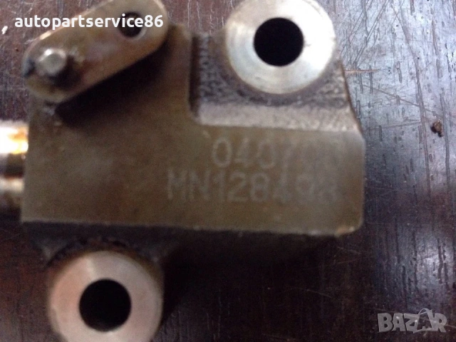 Обтегач и държач на ангренажна верига за Mitsubishi Colt 1.5 бензин (2003-2009), снимка 2 - Части - 54836362