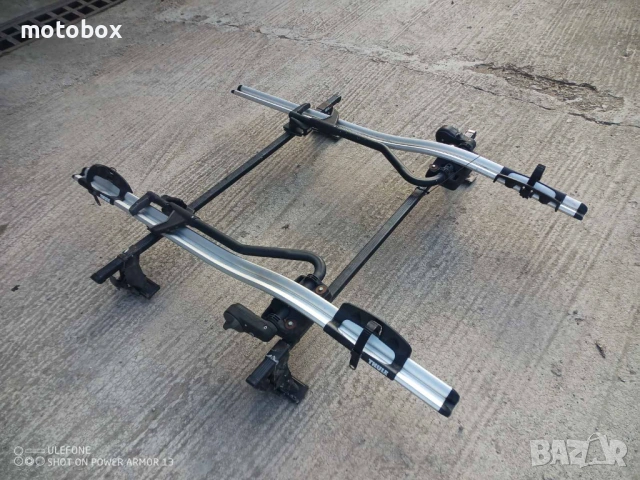 Продавам двоен багажник за велосипеди  и греди за таван Туле ., снимка 4 - Аксесоари за велосипеди - 54129270