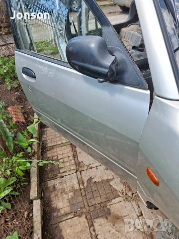 Обурудвани врати за Daihatsu Sirion 2003 г, снимка 4 - Части - 54396267