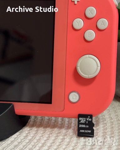 Nintendo Switch Lite Coral + 256GB SD карта! КАТО НОВ!, снимка 3 - Nintendo конзоли - 54508564
