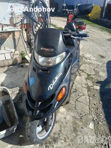 Скутер Кумко Динк 150