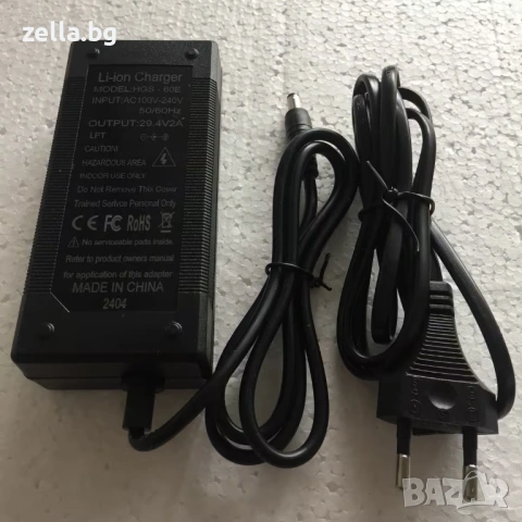 Зарядно устройство 24V Li-Ion 29.4V 2A 58W – за електрически тротинетки и велосипеди 10411, снимка 5 - Части за велосипеди - 54692874