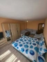 Продава се ексклузивно обзаведена едноетажна къща в с. Песнопой, снимка 6
