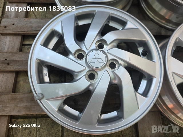 Лети джанти 14ки 4х100 Mitsubishi, снимка 5 - Гуми и джанти - 55178909
