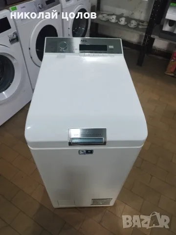 Пералня с горно зареждане AEG Protex Plus
