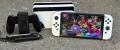 Игрова конзола Nintendo Switch OLED  + игра Mario Kart 8 Deluxe + 64GB карта  , снимка 1