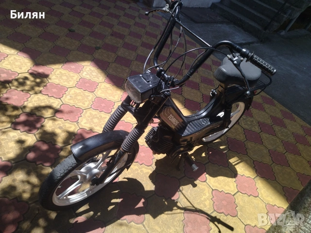Tomos