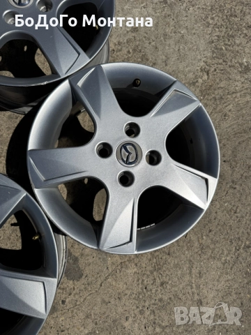 Алуминиеви джанти Mazda 15”, снимка 3 - Гуми и джанти - 55361979