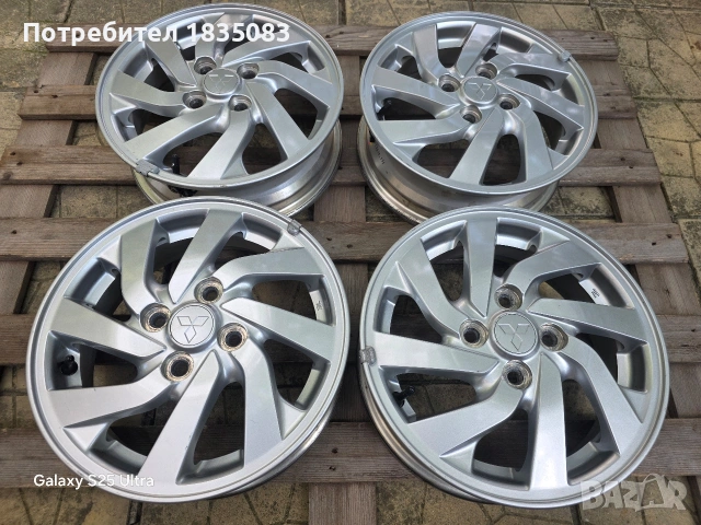 Лети джанти 14ки 4х100 Mitsubishi, снимка 3 - Гуми и джанти - 55178909