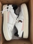 Продавам Cruyff Endorsed Tennis sneakers in a white colorway with orange and black accents, снимка 1