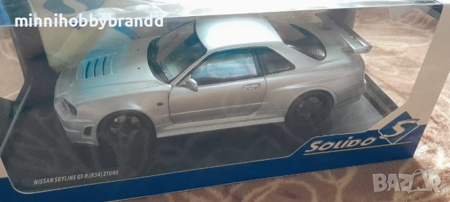 Nissan Skyline GtR R 34 1.18 Solido , снимка 3 - Колекции - 54484436