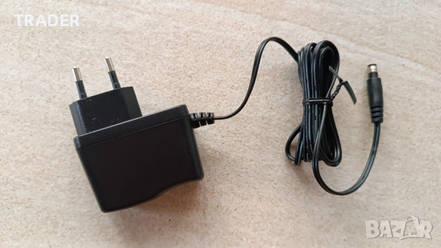  Зарядно charger input 100- 240v - 50/60 Hz 0.3 A Output 12V - 0.5A, 6W