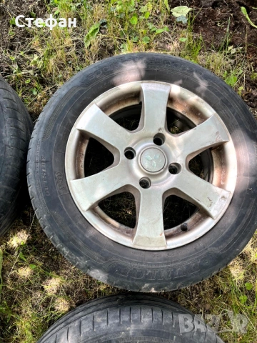  Продавам алуминиеви джанти Mitsubishi 15 цола 4x114.3, снимка 4 - Гуми и джанти - 54675240
