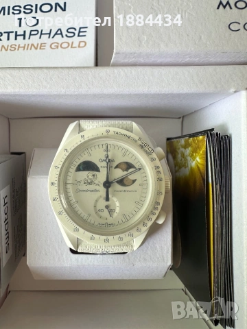 Чисто нов Swatch Omega Mission to Earth Phase moonshine gold