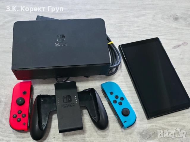 Nintendo Switch OLED + докинг станция и поставка за JOY CONS