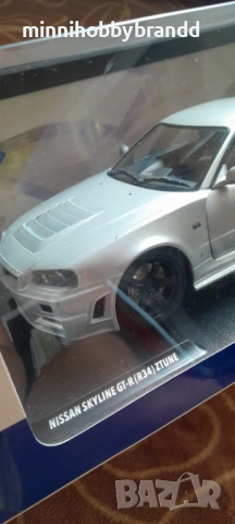 Nissan Skyline GtR R 34 1.18 Solido , снимка 14 - Колекции - 54484436