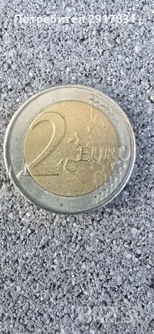 монета от 2 евро с изместен център