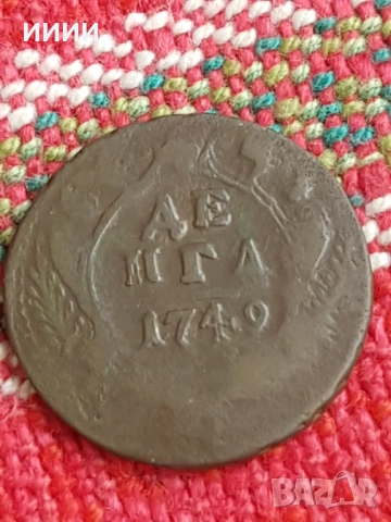 Монета денга 