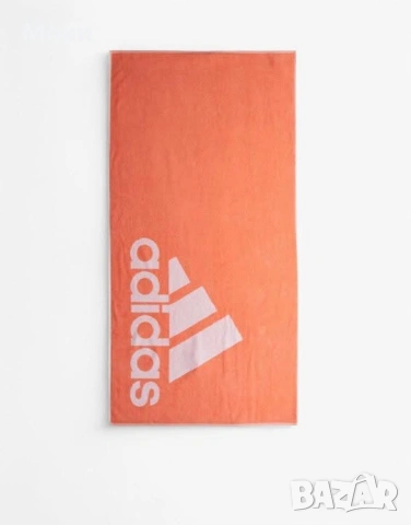 ADIDAS Swim Towel Large Orange  Оранжевата плажна кърпа Adidas Swim Towel Large Orange е изработена 