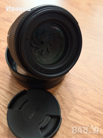 Обектив Sigma 56mm F1.4 Sony E-mount + филтър Walimex Pro Slim MC UV 55mm | Перфектно състояние, снимка 2 - Обективи и филтри - 54658909