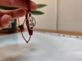 Червена гривна за късмет с елементи от стомана, снимка 1