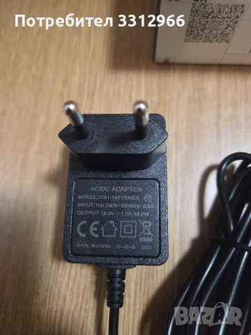Захранващ адаптер модел J151-1801000EX с изходно напрежение 18.0V и ток 1.0A., снимка 2 - Друга електроника - 55342718