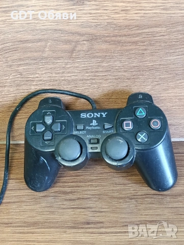 джойстик за PlayStation 2.