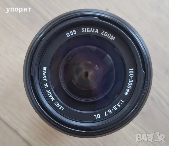 Sigma zoom 100-300mm 1 4.5-6.7 dl за Canon EF