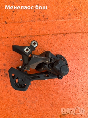 Shimano Deore Shadow+ 11-speed (серия M5100/M5120).