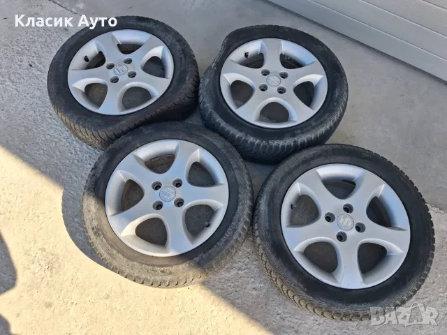 Алуминиеви джанти Suzuki 4x100 15-цола, снимка 2 - Гуми и джанти - 55586004