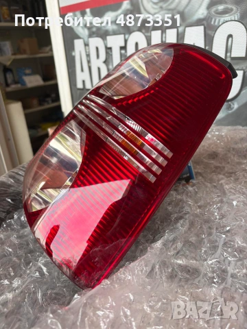 Чисто нов oригинален десен стоп HELLA за VW Touran (2003-2006) - с платка, снимка 5 - Аксесоари и консумативи - 55142068