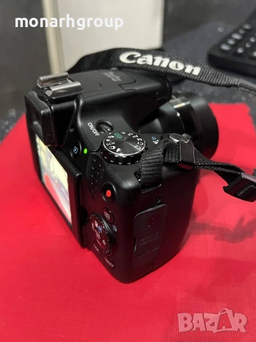 Фотоапарат Canon sx50hs със зарядно и чанта, снимка 2 - Фотоапарати - 54232199