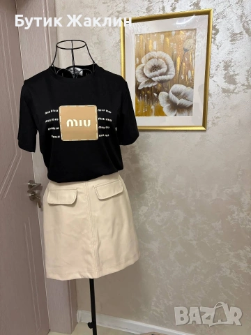 Тениска и кожена пола