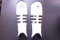 Футболни кори Adidas футбол калци протектори спорт топка гол бяло черно спортист футболист обувки, снимка 1