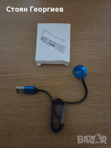 магнитно USB зарядно устройство за фенери от марката Olight. 