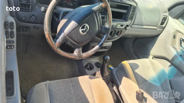 Mazda Tribute  2.0, снимка 12 - Автомобили и джипове - 55571611