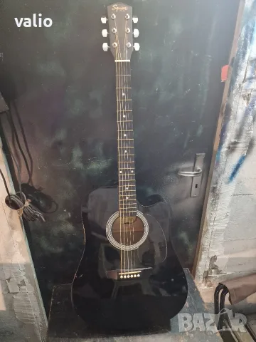 Електро-акустична китара Squier by Fender, модел SA-105CE.