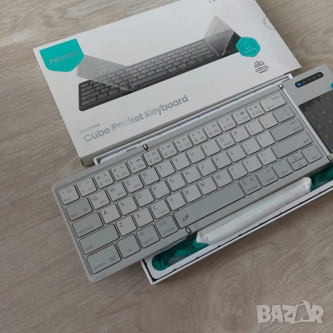 Преносима сгъваема Bluetooth клавиатура Nillkin Cube Pocket с тъчпад и Numpad, за таблет, телефон, снимка 2 - Клавиатури и мишки - 55278320