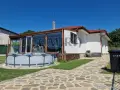 Модерна къща на пешеходно разстояние от плажа, снимка 1
