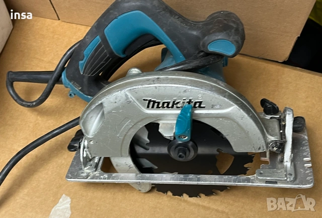 Makita HS6601 ръчен циркуляр комплект с нов диск 220V 1050W 165mm 5200 rpm, снимка 3 - Други инструменти - 54557675