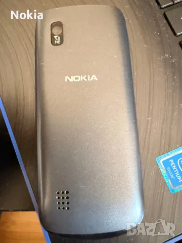 Nokia Asha 300 (познат още като Nokia 300 Touch and Type), пуснат на пазара през 2011 година, снимка 2 - Nokia - 55423294