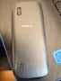 Nokia Asha 300 (познат още като Nokia 300 Touch and Type), пуснат на пазара през 2011 година, снимка 2
