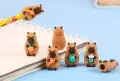 4 бр малки фигурки Капибара Capybara гумирани гумени с дупка за молив играчки украса торта фигурка, снимка 1
