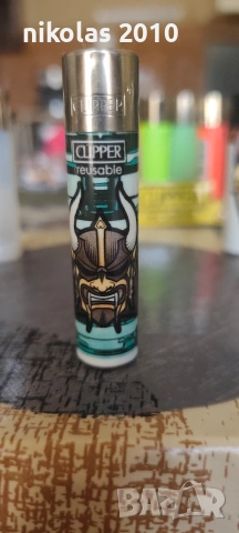 Колекция от 37 оригинални запалки Clipper + подарък дисплей (поставка), снимка 8 - Колекции - 54563525